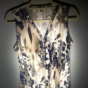 Dana Buchman sleeveless blouse. V neck with cheetah and snake print. Size S.
